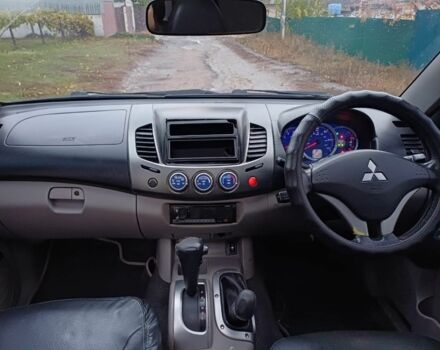 Черный Мицубиси Л 200, объемом двигателя 2.5 л и пробегом 170 тыс. км за 5900 $, фото 9 на Automoto.ua