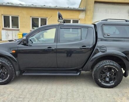 Черный Мицубиси Л 200, объемом двигателя 2.5 л и пробегом 278 тыс. км за 4200 $, фото 2 на Automoto.ua