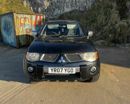 Черный Мицубиси Л 200, объемом двигателя 2 л и пробегом 209 тыс. км за 5803 $, фото 1 на Automoto.ua