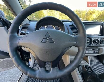 Міцубісі Л 200 2007 у Одесі на Automoto.ua Чорний Міцубісі Л 200, об'ємом двигуна 2.5 л та пробігом 83 тис. км за 15200 $, фото 12 на Automoto.ua