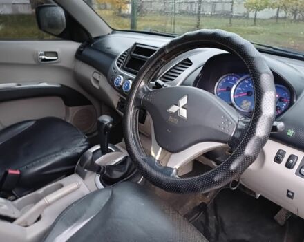 Черный Мицубиси Л 200, объемом двигателя 2.5 л и пробегом 170 тыс. км за 5900 $, фото 10 на Automoto.ua