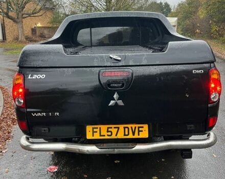 Черный Мицубиси Л 200, объемом двигателя 2.5 л и пробегом 190 тыс. км за 6655 $, фото 4 на Automoto.ua