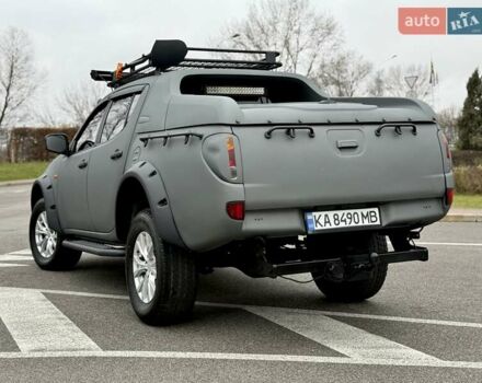 Черный Мицубиси Л 200, объемом двигателя 2.48 л и пробегом 232 тыс. км за 13900 $, фото 11 на Automoto.ua