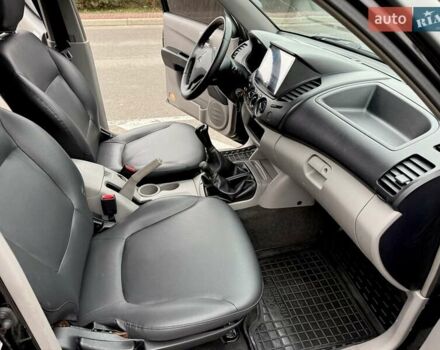 Черный Мицубиси Л 200, объемом двигателя 2.48 л и пробегом 232 тыс. км за 13900 $, фото 39 на Automoto.ua