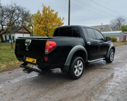 Черный Мицубиси Л 200, объемом двигателя 2.5 л и пробегом 170 тыс. км за 5900 $, фото 7 на Automoto.ua