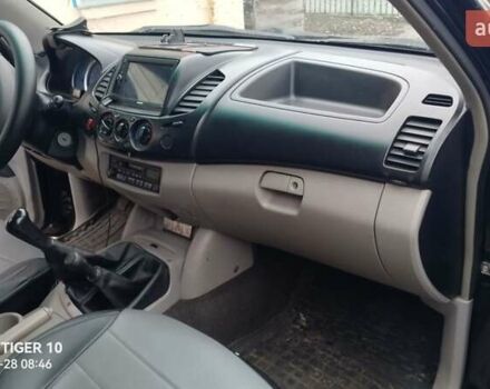 Чорний Міцубісі Л 200, об'ємом двигуна 2.48 л та пробігом 198 тис. км за 11500 $, фото 2 на Automoto.ua