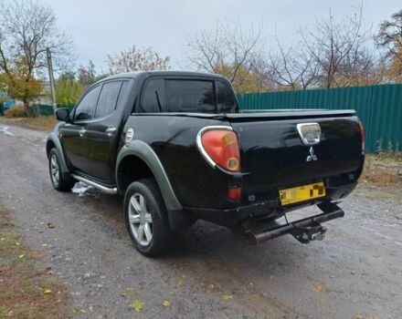 Черный Мицубиси Л 200, объемом двигателя 2.5 л и пробегом 170 тыс. км за 5900 $, фото 6 на Automoto.ua