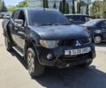 Черный Мицубиси Л 200, объемом двигателя 2.5 л и пробегом 150 тыс. км за 3999 $, фото 1 на Automoto.ua