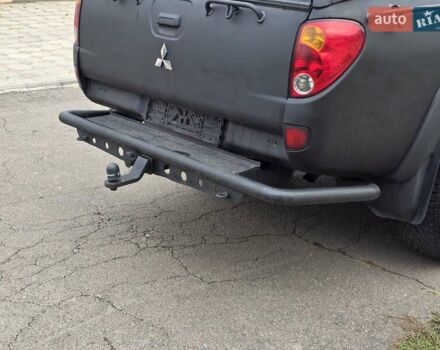 Мицубиси Л 200 2007 в Одессе на Automoto.ua Черный Мицубиси Л 200, объемом двигателя 2.48 л и пробегом 186 тыс. км за 12200 $, фото 10 на Automoto.ua