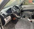 Черный Мицубиси Л 200, объемом двигателя 2.48 л и пробегом 280 тыс. км за 10500 $, фото 4 на Automoto.ua