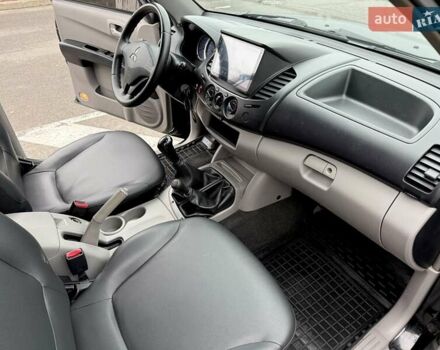 Черный Мицубиси Л 200, объемом двигателя 2.48 л и пробегом 232 тыс. км за 13900 $, фото 41 на Automoto.ua