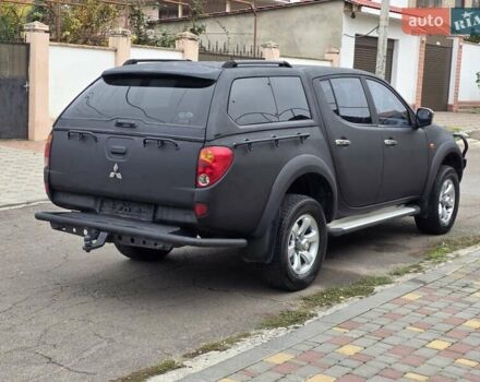 Мицубиси Л 200 2007 в Одессе на Automoto.ua Черный Мицубиси Л 200, объемом двигателя 2.48 л и пробегом 186 тыс. км за 12200 $, фото 5 на Automoto.ua