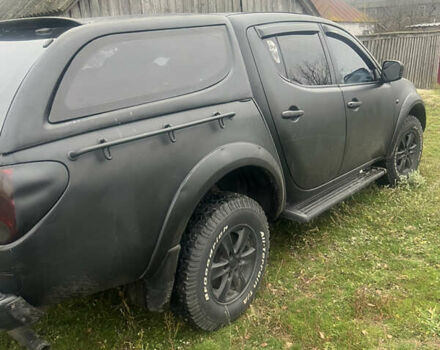 Черный Мицубиси Л 200, объемом двигателя 2.5 л и пробегом 287 тыс. км за 9000 $, фото 1 на Automoto.ua