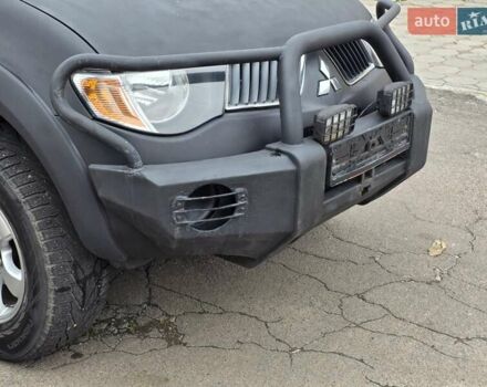 Мицубиси Л 200 2007 в Одессе на Automoto.ua Черный Мицубиси Л 200, объемом двигателя 2.48 л и пробегом 186 тыс. км за 12200 $, фото 11 на Automoto.ua