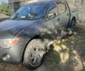 Черный Мицубиси Л 200, объемом двигателя 2.5 л и пробегом 298 тыс. км за 7500 $, фото 1 на Automoto.ua