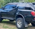 Черный Мицубиси Л 200, объемом двигателя 2.5 л и пробегом 392 тыс. км за 15500 $, фото 1 на Automoto.ua