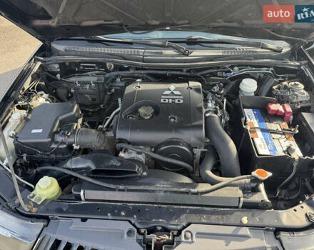 Мицубиси Л 200 2007 в Киеве на Automoto.ua Черный Мицубиси Л 200, объемом двигателя 2.48 л и пробегом 283 тыс. км за 10999 $, фото 33 на Automoto.ua