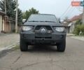 Мицубиси Л 200 2007 в Одессе на Automoto.ua Черный Мицубиси Л 200, объемом двигателя 2.48 л и пробегом 186 тыс. км за 12200 $, фото 1 на Automoto.ua