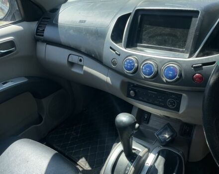 Черный Мицубиси Л 200, объемом двигателя 2.5 л и пробегом 300 тыс. км за 4311 $, фото 7 на Automoto.ua