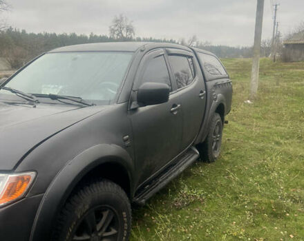 Черный Мицубиси Л 200, объемом двигателя 2.5 л и пробегом 287 тыс. км за 9000 $, фото 3 на Automoto.ua