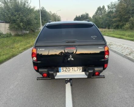 Черный Мицубиси Л 200, объемом двигателя 2.5 л и пробегом 210 тыс. км за 5455 $, фото 4 на Automoto.ua