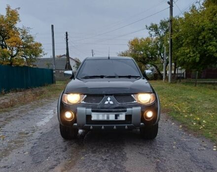 Черный Мицубиси Л 200, объемом двигателя 2.5 л и пробегом 170 тыс. км за 5900 $, фото 1 на Automoto.ua