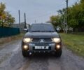 Черный Мицубиси Л 200, объемом двигателя 2.5 л и пробегом 170 тыс. км за 5900 $, фото 1 на Automoto.ua