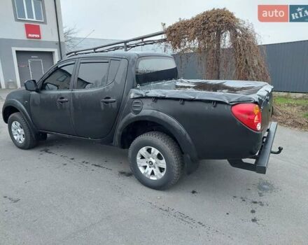 Чорний Міцубісі Л 200, об'ємом двигуна 2.48 л та пробігом 290 тис. км за 9900 $, фото 27 на Automoto.ua