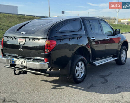 Мицубиси Л 200 2007 в Киеве на Automoto.ua Черный Мицубиси Л 200, объемом двигателя 2.48 л и пробегом 283 тыс. км за 10999 $, фото 5 на Automoto.ua