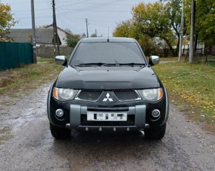 Черный Мицубиси Л 200, объемом двигателя 2.5 л и пробегом 170 тыс. км за 5900 $, фото 2 на Automoto.ua