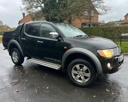 Черный Мицубиси Л 200, объемом двигателя 2.5 л и пробегом 190 тыс. км за 6655 $, фото 1 на Automoto.ua