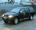 Черный Мицубиси Л 200, объемом двигателя 2.5 л и пробегом 199 тыс. км за 11800 $, фото 1 на Automoto.ua