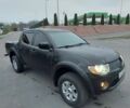 Черный Мицубиси Л 200, объемом двигателя 0 л и пробегом 300 тыс. км за 8000 $, фото 1 на Automoto.ua