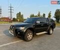 Черный Мицубиси Л 200, объемом двигателя 2.48 л и пробегом 230 тыс. км за 13555 $, фото 1 на Automoto.ua