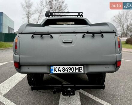 Черный Мицубиси Л 200, объемом двигателя 2.48 л и пробегом 232 тыс. км за 13900 $, фото 12 на Automoto.ua