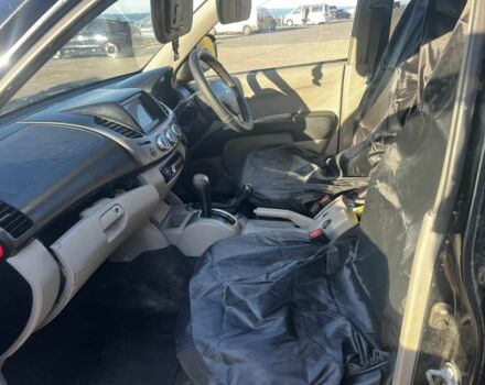 Черный Мицубиси Л 200, объемом двигателя 2 л и пробегом 209 тыс. км за 5803 $, фото 4 на Automoto.ua