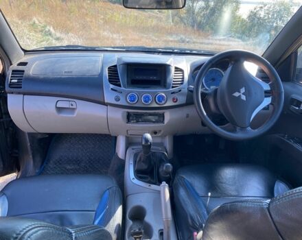 Черный Мицубиси Л 200, объемом двигателя 0 л и пробегом 177 тыс. км за 5500 $, фото 6 на Automoto.ua