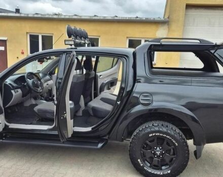 Черный Мицубиси Л 200, объемом двигателя 2.5 л и пробегом 278 тыс. км за 4200 $, фото 3 на Automoto.ua