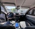 Черный Мицубиси Л 200, объемом двигателя 2.5 л и пробегом 320 тыс. км за 11200 $, фото 10 на Automoto.ua
