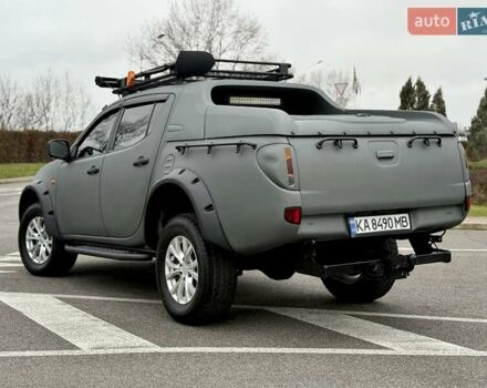 Черный Мицубиси Л 200, объемом двигателя 2.48 л и пробегом 232 тыс. км за 13900 $, фото 10 на Automoto.ua