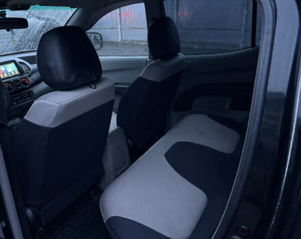 Черный Мицубиси Л 200, объемом двигателя 2.5 л и пробегом 199 тыс. км за 11800 $, фото 6 на Automoto.ua