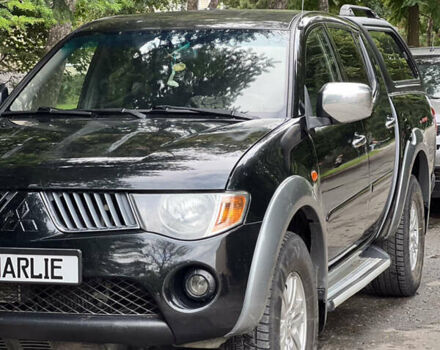 Черный Мицубиси Л 200, объемом двигателя 2.5 л и пробегом 221 тыс. км за 12800 $, фото 21 на Automoto.ua