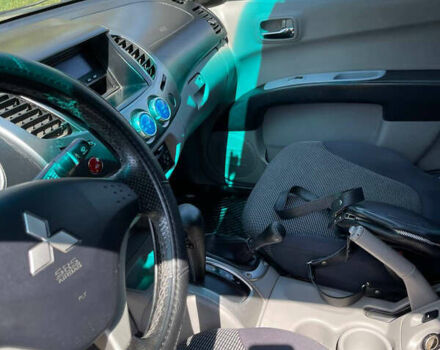 Черный Мицубиси Л 200, объемом двигателя 2.5 л и пробегом 221 тыс. км за 12800 $, фото 10 на Automoto.ua