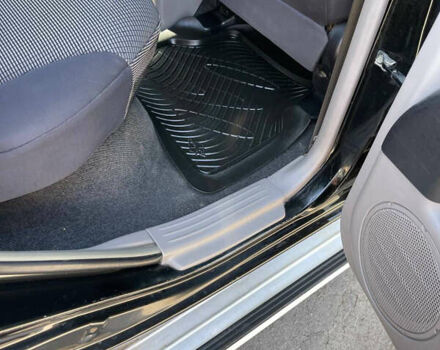 Черный Мицубиси Л 200, объемом двигателя 2.5 л и пробегом 221 тыс. км за 12800 $, фото 19 на Automoto.ua