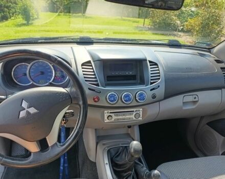Черный Мицубиси Л 200, объемом двигателя 2.5 л и пробегом 230 тыс. км за 3150 $, фото 6 на Automoto.ua