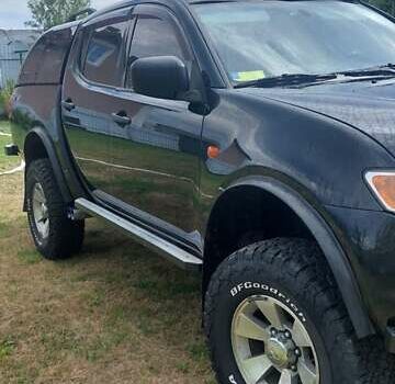 Черный Мицубиси Л 200, объемом двигателя 2.48 л и пробегом 392 тыс. км за 15500 $, фото 37 на Automoto.ua