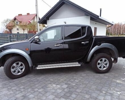 Черный Мицубиси Л 200, объемом двигателя 2.5 л и пробегом 270 тыс. км за 3424 $, фото 4 на Automoto.ua