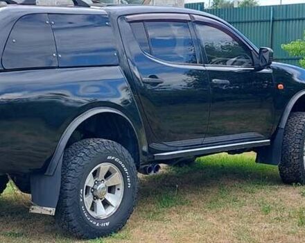 Черный Мицубиси Л 200, объемом двигателя 2.48 л и пробегом 392 тыс. км за 15500 $, фото 5 на Automoto.ua