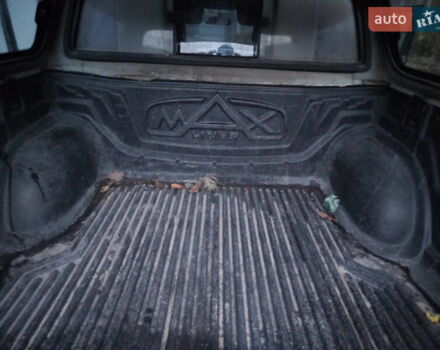 Чорний Міцубісі Л 200, об'ємом двигуна 2.48 л та пробігом 219 тис. км за 10500 $, фото 31 на Automoto.ua