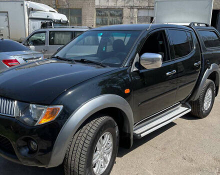 Черный Мицубиси Л 200, объемом двигателя 2.5 л и пробегом 221 тыс. км за 12800 $, фото 15 на Automoto.ua